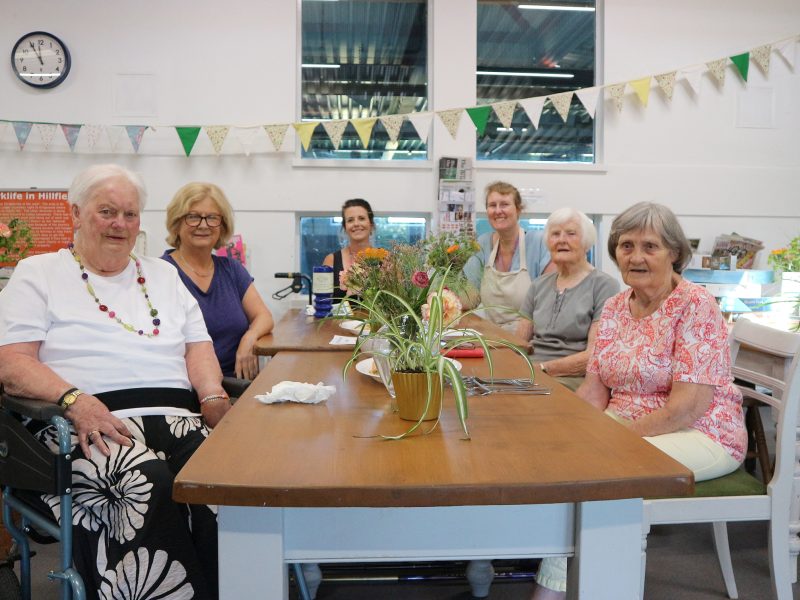 Centre coordinator Sam Hickman and community kitchen lead Misty Tunks with customers of the first community lunch at Hillfields Park Community Centre