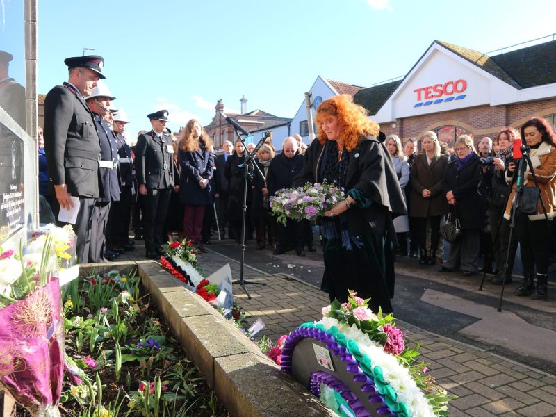 Bex Lombard-Earl lays a wreath in Staple Hill in memory of her sister