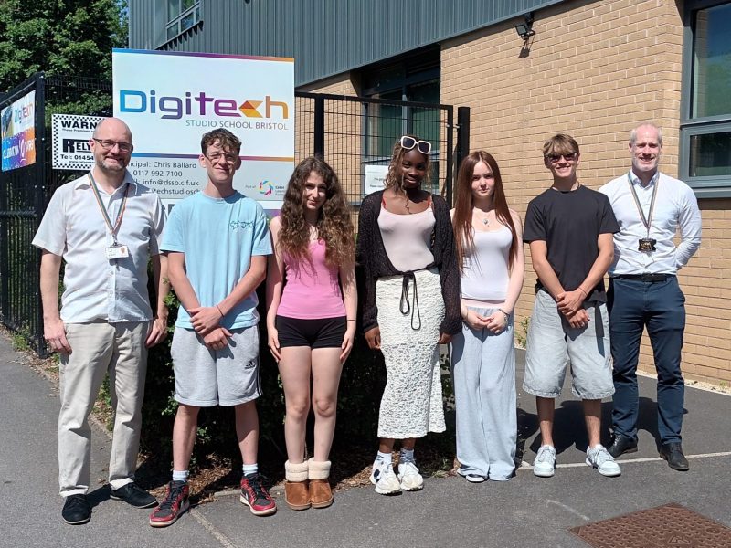 Principal Chris Ballard, right, and head of school Simon Jones, left, with Digitech students