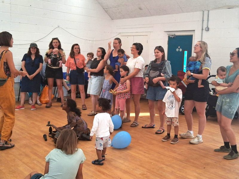 The Bring Your Own Baby choir sings at the fun day